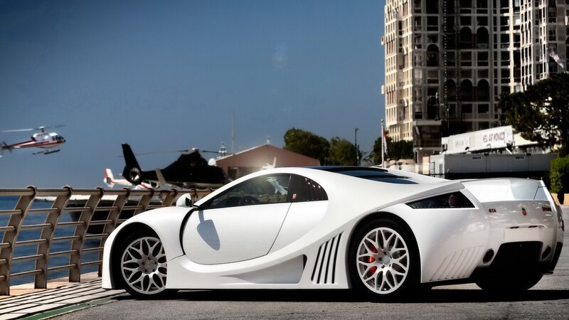 White sports car by the waterfront