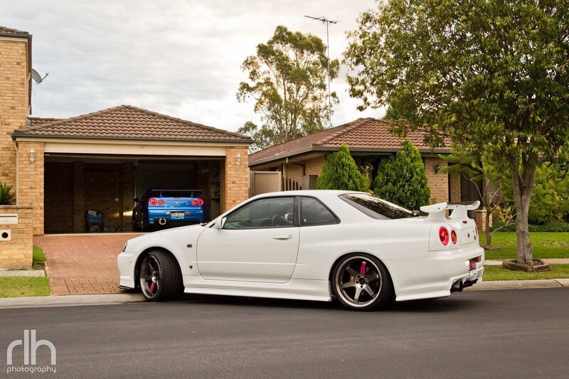 White Sports Car — Calm, Afternoon, Photograph, Blue Car