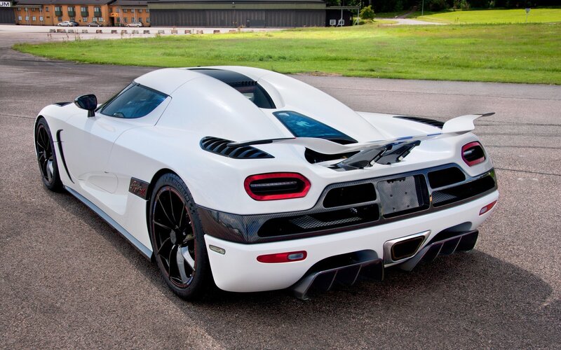White Sports Car — Calm, Afternoon, Photograph, Building