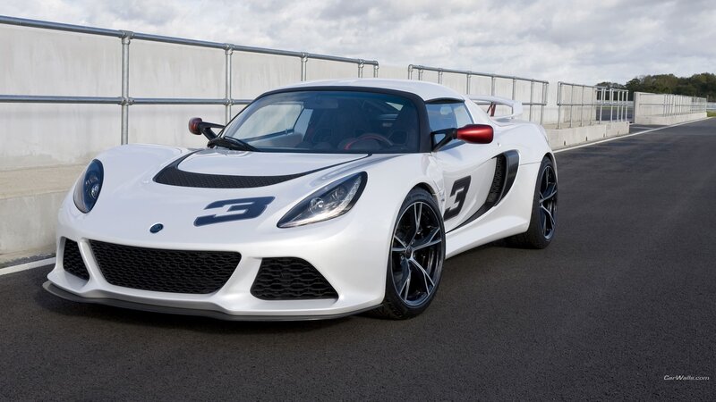 White Sports Car — Calm, Afternoon, Photograph, Race Track, Fence