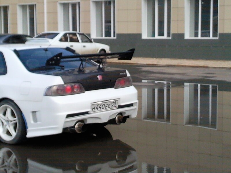 White Sports Car — Damp