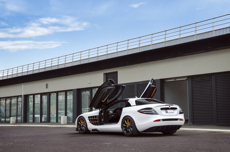 White Sports Car — Dramatic, Afternoon, Photograph, Building, Doors, Sky