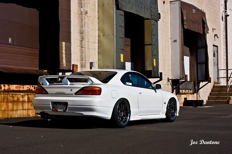 White Sports Car — Dramatic, Afternoon, Photograph, Building, Tire, Tail Light