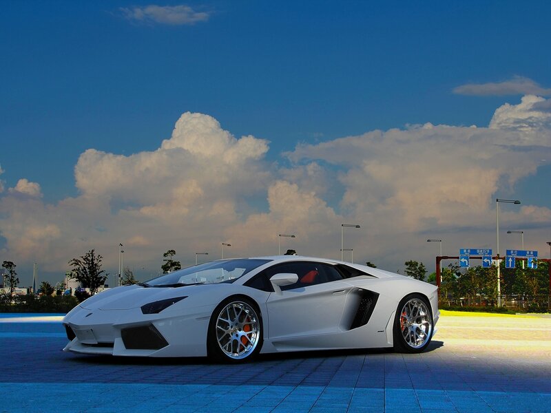 White Sports Car — Dramatic, Afternoon, Photograph, Clouds
