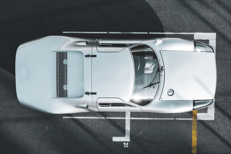 White Sports Car — Dramatic, Afternoon, Photograph, Parking Lot