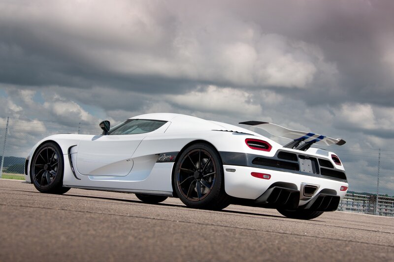 White Sports Car — Dramatic, Afternoon, Photograph, Race Track, Cloudy Sky
