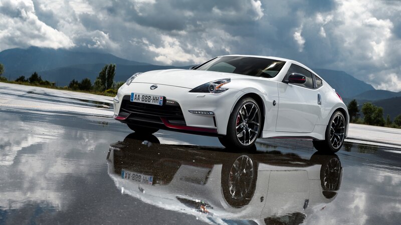 White Sports Car — Dramatic, Afternoon, Photograph, Wet Road