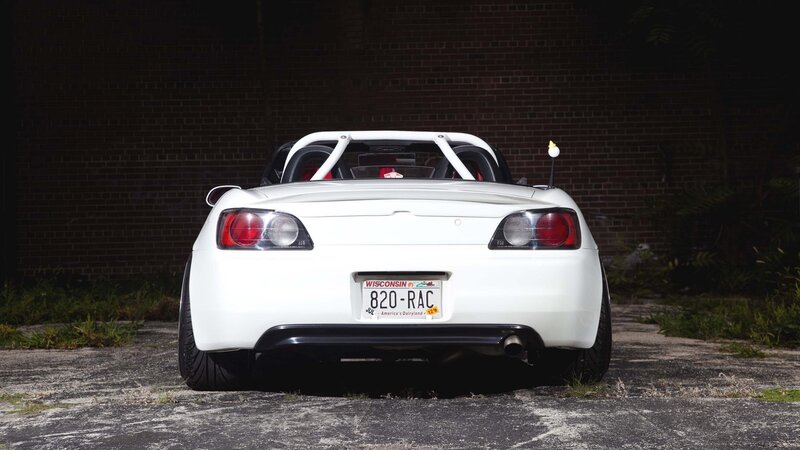 White Sports Car — Dramatic, Night, Photograph, Bricks