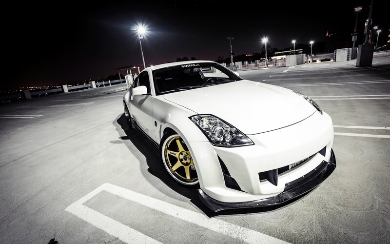 White Sports Car — Dramatic, Night, Photograph, Gold Wheels, Parking Lot, Streetlights, Black, Gold