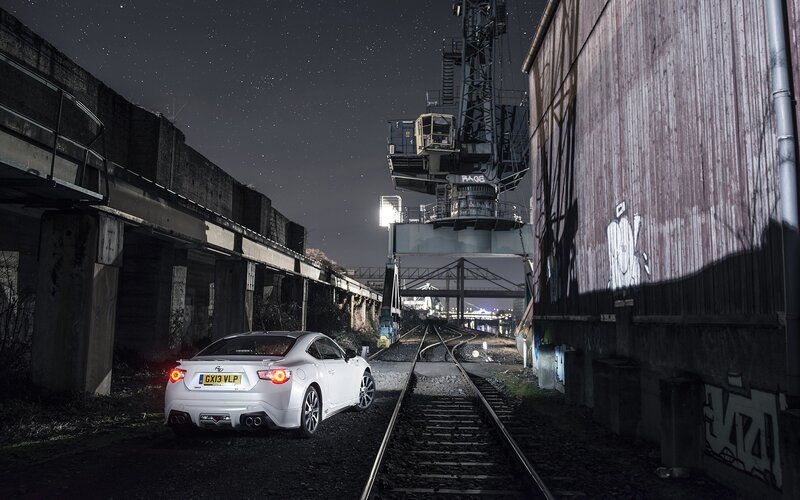 White Sports Car — Dramatic, Night, Photograph, Train Tracks