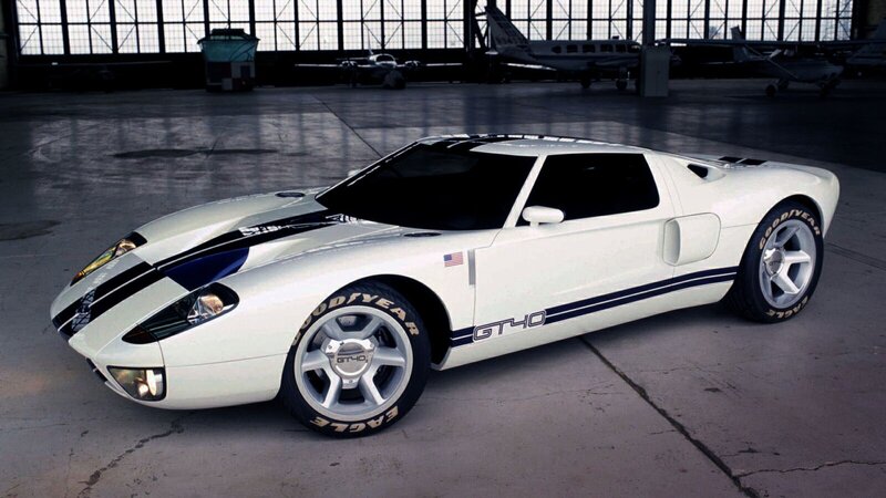 White Sports Car — Dramatic, Photograph, Airplane, Hangar, Tire