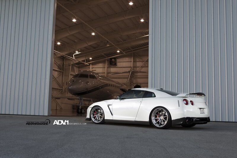 White Sports Car — Dramatic, Photograph, Airplane, Hangar, Wheels, Gray