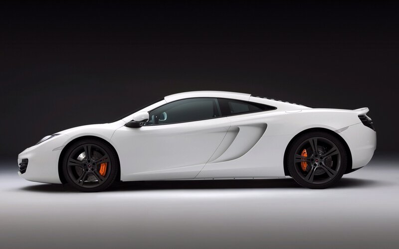 White Sports Car — Dramatic, Photograph, Black Wheels, Orange Brake Calipers