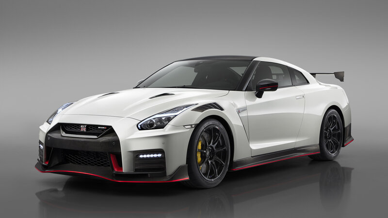White Sports Car — Dramatic, Photograph, Black Wheels, Rear Wing, Carbon Fiber