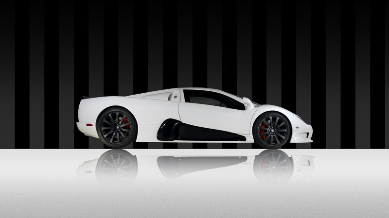 White Sports Car — Dramatic, Photograph, Black Wheels, Striped Background, Reflection
