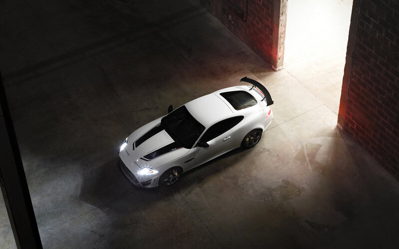 White Sports Car — Dramatic, Photograph, Brick Wall
