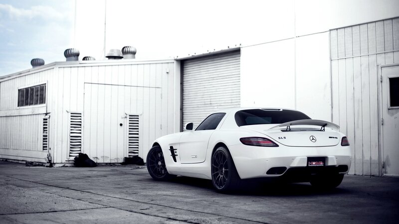 White Sports Car — Dramatic, Photograph, Building, Garage Door