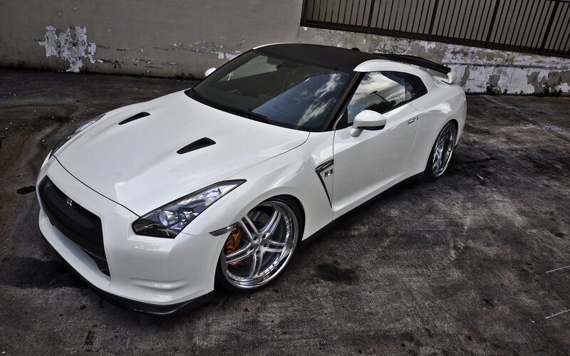 White Sports Car — Dramatic, Photograph, Concrete Ground