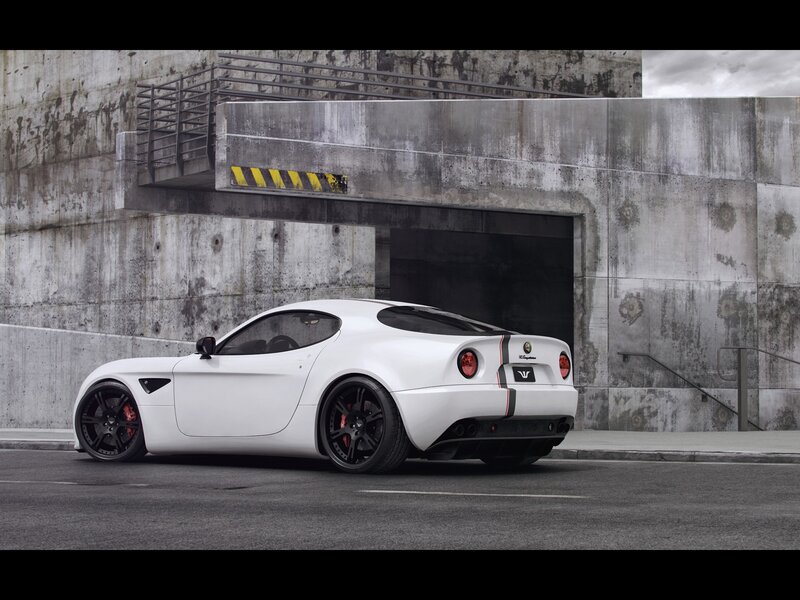 White Sports Car — Dramatic, Photograph, Concrete Wall, Tires, Black