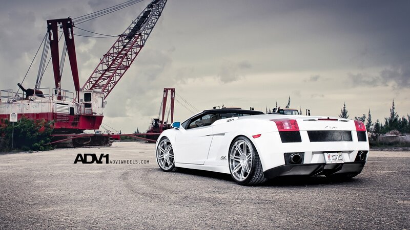 White Sports Car — Dramatic, Photograph, Crane