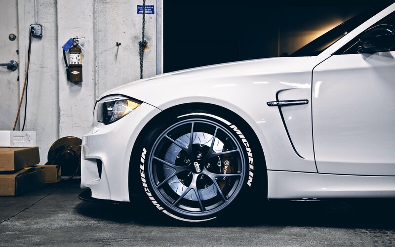 White Sports Car — Dramatic, Photograph, Fire Extinguisher