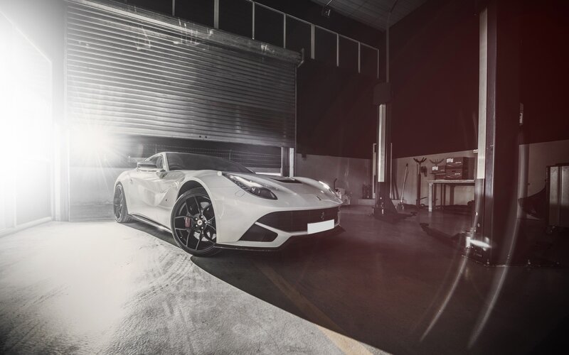 White Sports Car — Dramatic, Photograph, Garage, Car Lift