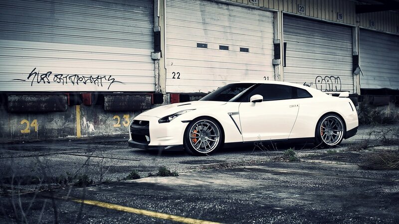 White Sports Car — Dramatic, Photograph, Garage Doors