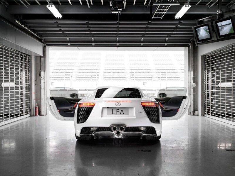 White Sports Car — Dramatic, Photograph, Garage, Race Track