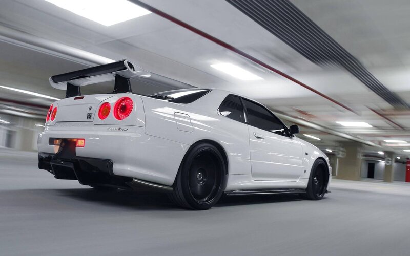 White Sports Car — Dramatic, Photograph, Parking Garage, Taillights