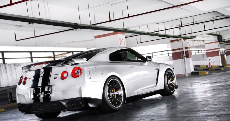 White Sports Car — Dramatic, Photograph, Parking Garage, Tire