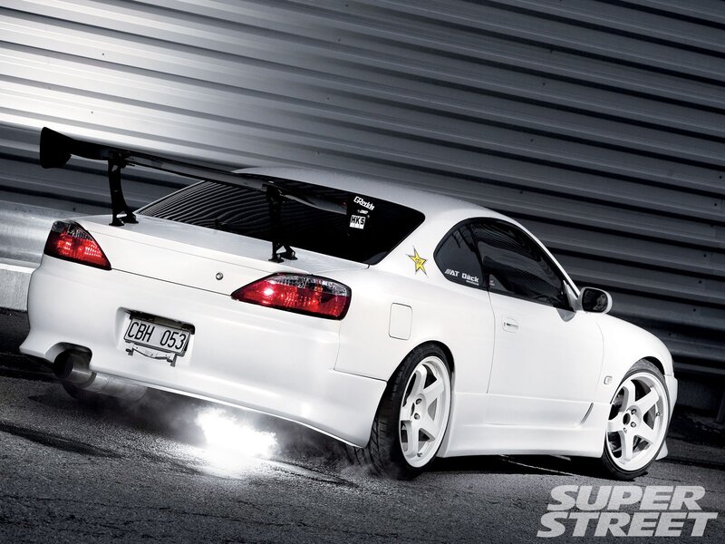 White Sports Car — Dramatic, Photograph, Rear Wing, Exhaust Smoke
