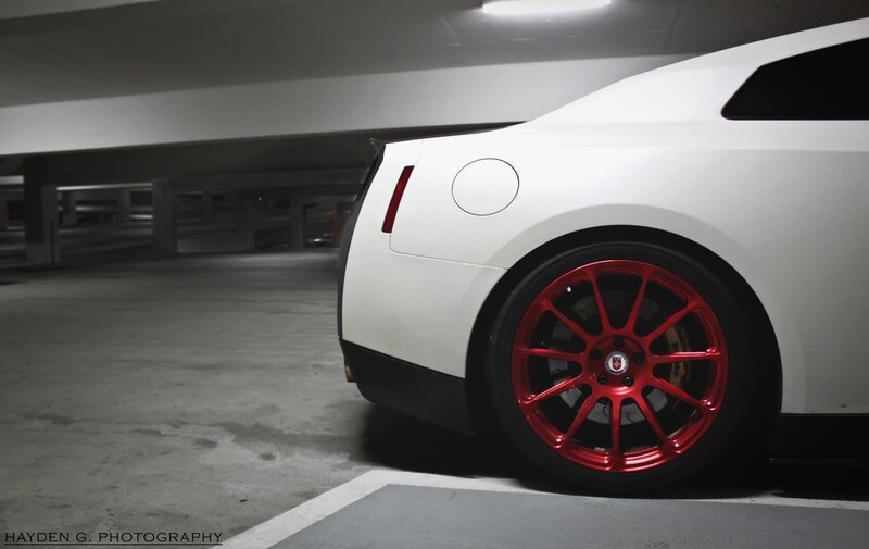 White Sports Car — Dramatic, Photograph, Red Wheels