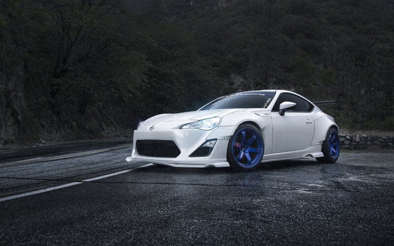 White Sports Car — Dramatic, Photograph, Road, Trees