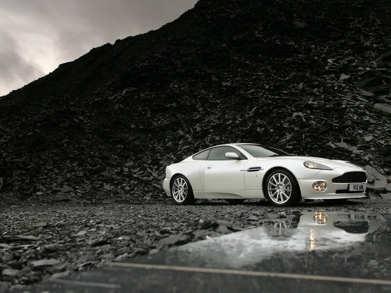 White Sports Car — Dramatic, Photograph, Rock Pile