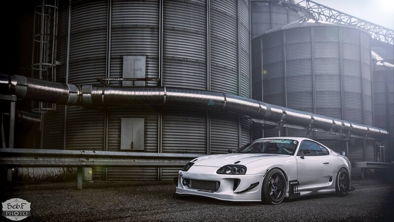 White Sports Car — Dramatic, Photograph, Silos