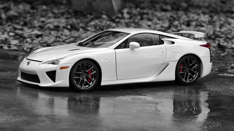 White Sports Car — Dramatic, Photograph, Wet Pavement