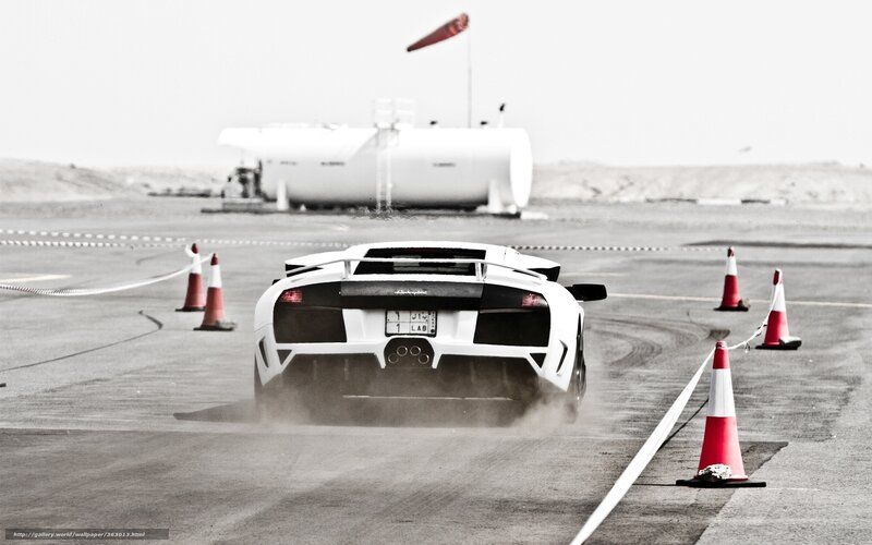 white sports car drifting