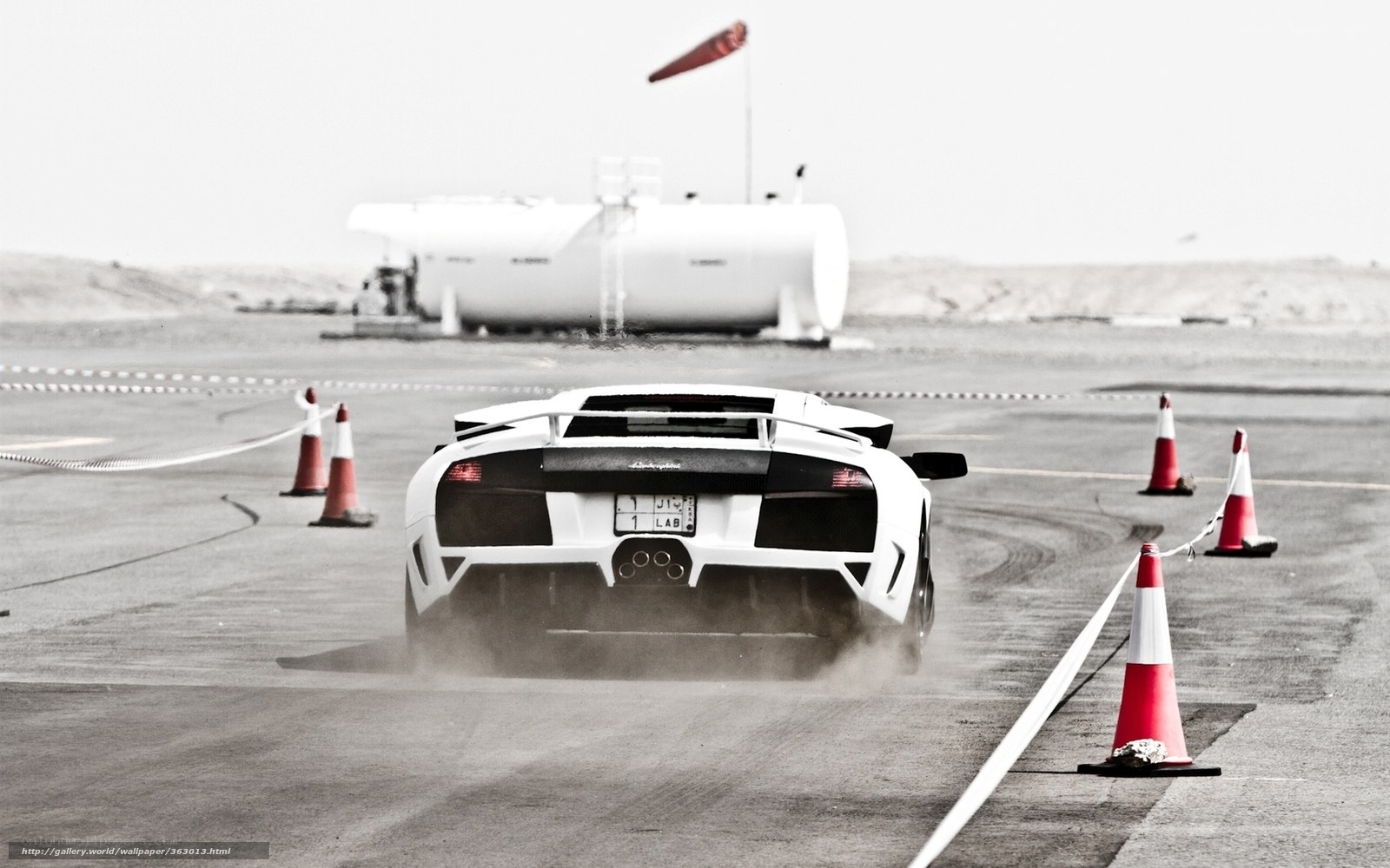 white sports car drifting