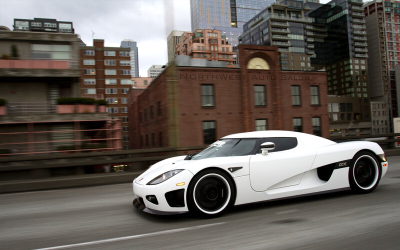 White Sports Car — Dynamic, Afternoon, Photograph, City Buildings