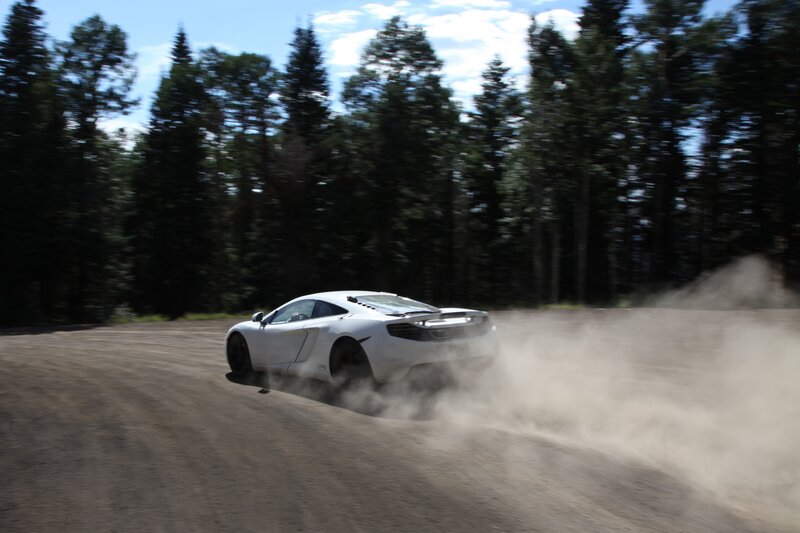 White Sports Car — Dynamic, Afternoon, Photograph, Dirt Road, Trees, Dust