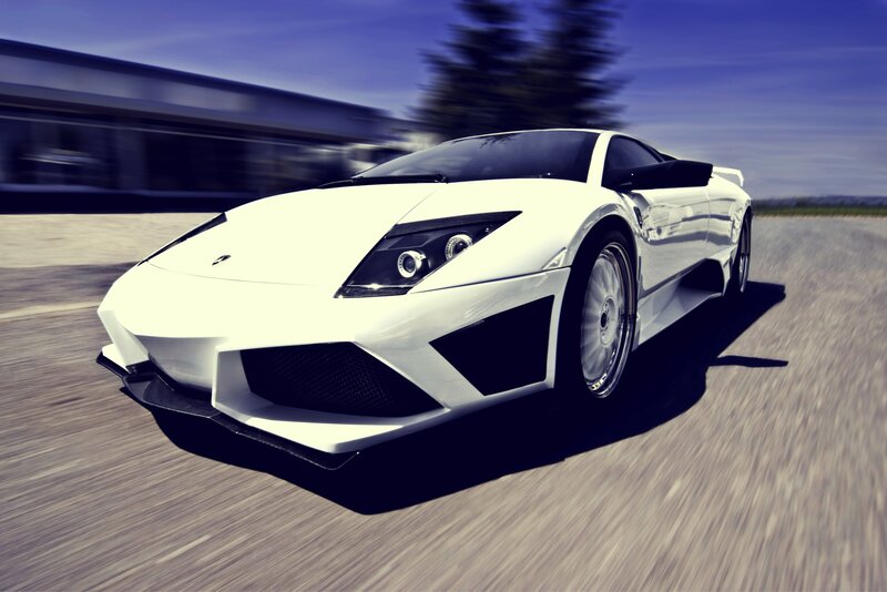 White Sports Car — Dynamic, Afternoon, Photograph, Road, Building