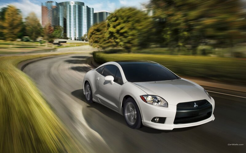 White Sports Car — Dynamic, Afternoon, Photograph, Road, Buildings