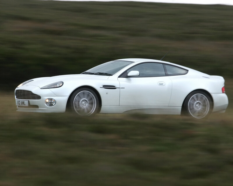 White Sports Car — Dynamic, Photograph, Grass