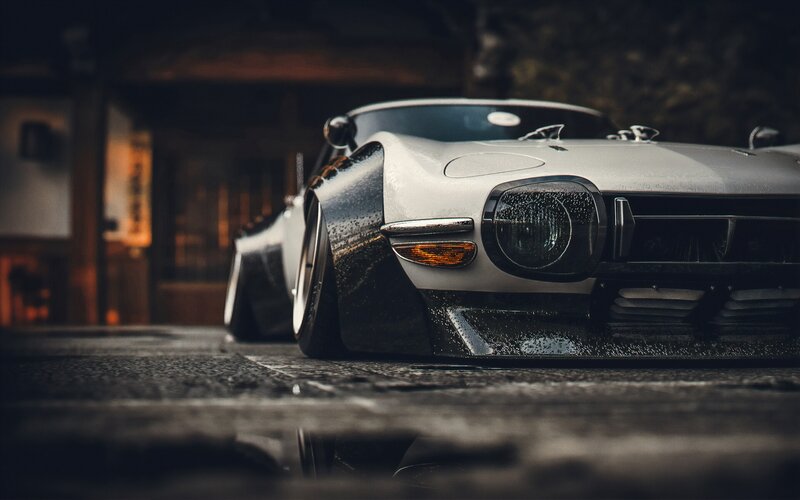 White Sports Car — Gray, Dramatic, Night, Photograph, Wet Pavement, Building