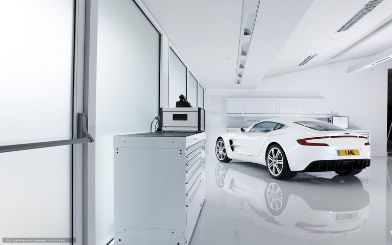 White sports car in a clean garage