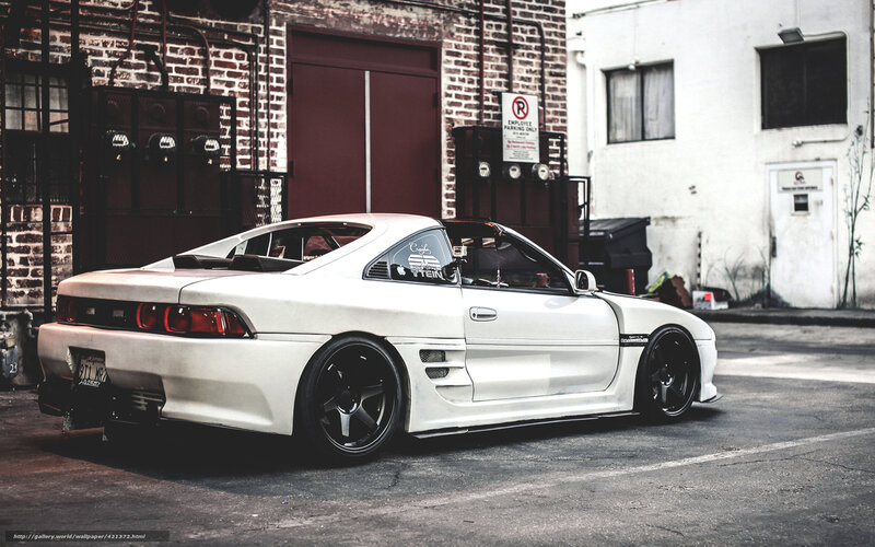 white sports car in alley