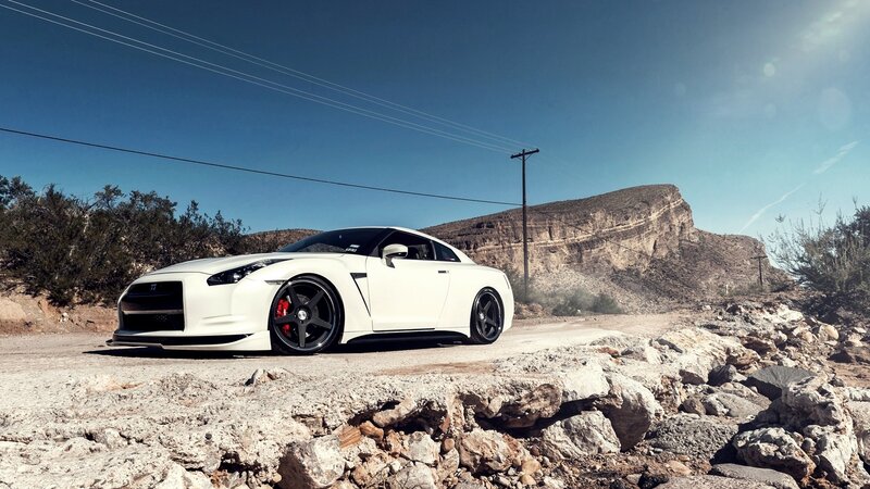 White sports car in desert