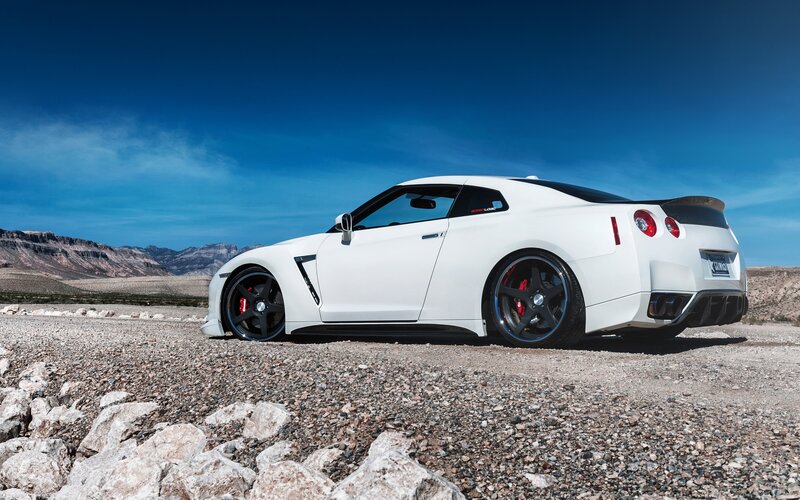 white sports car in desert