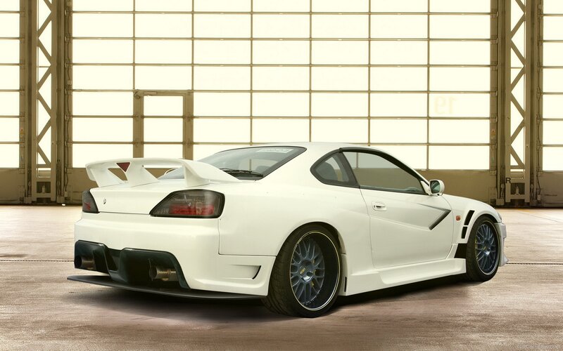 white sports car in garage