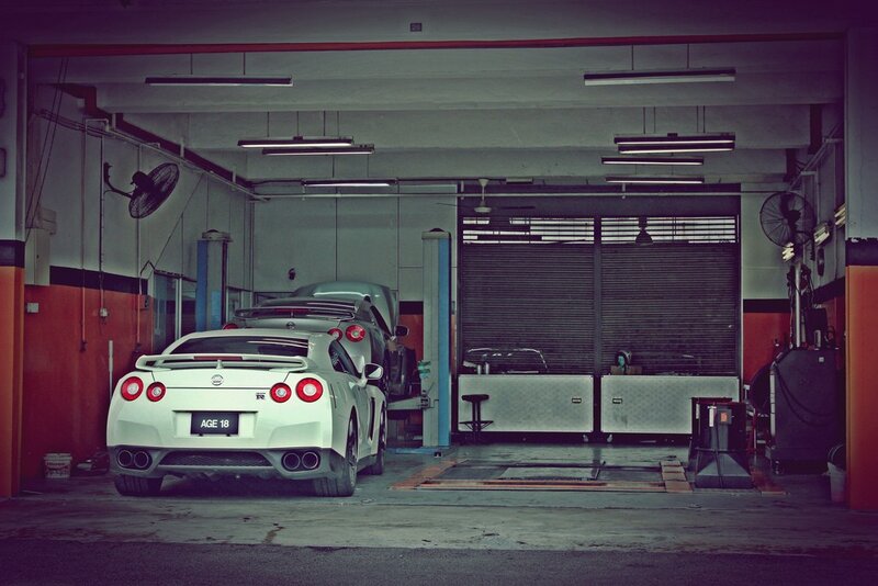 White sports car in garage